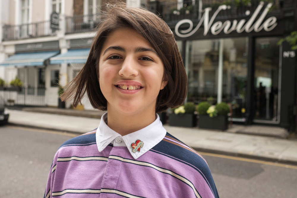 11-Year-old cuts hair at Neville Salon To raise funds for Chain of Hope